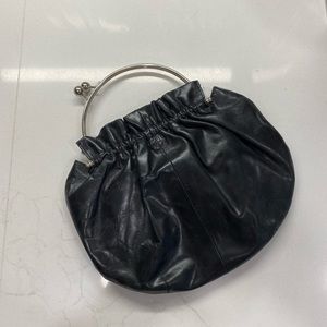 Vintage Bebe leather handbag with pink lining